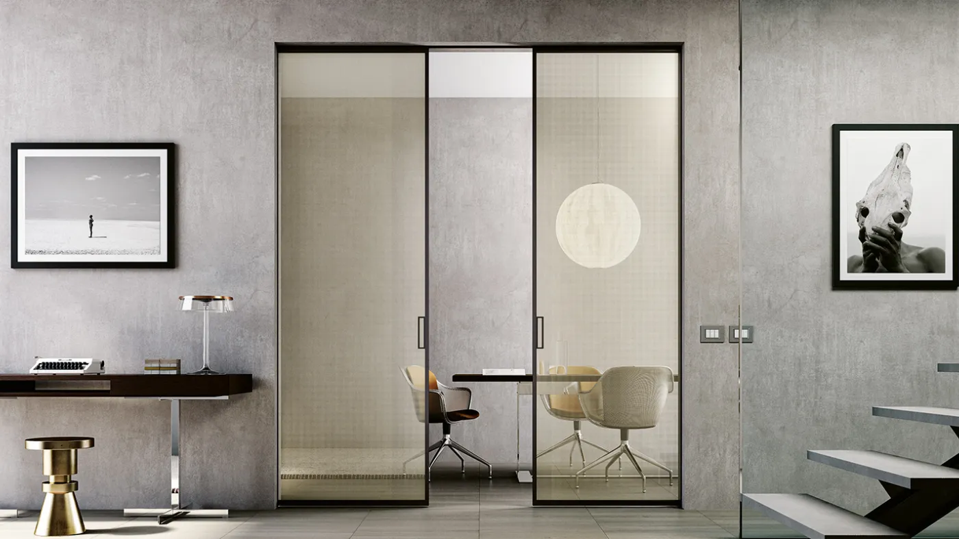 portes coulissantes intérieures affleurantes en verre et aluminium conçues par Bertolotto Portes intérieures
